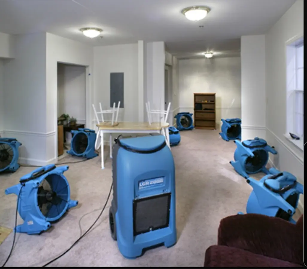 Air movers and dehumidifier setup for Water Damage Restoration in Conyers